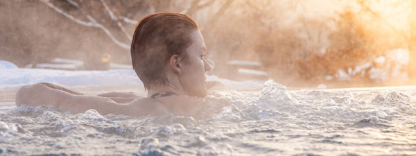 woman using a hot tub in winter