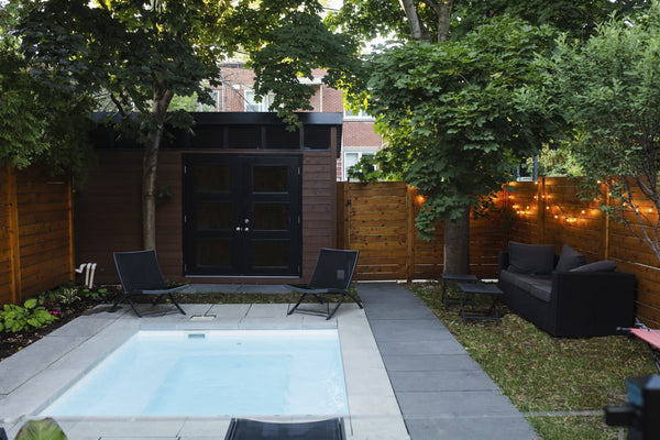 A swim spa in a backyard retreat