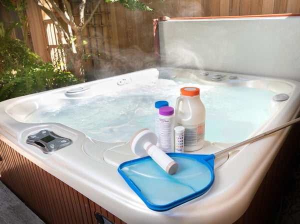 The useful cleaning products required for spa care sitting on top of a hot tub